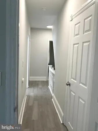 a bathroom with a toilet a sink and bathtub