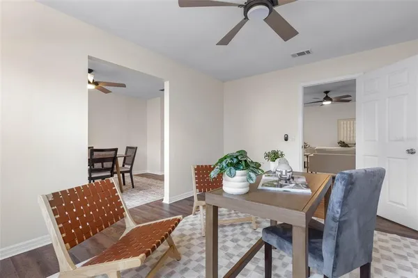 a view of a dining room with furniture