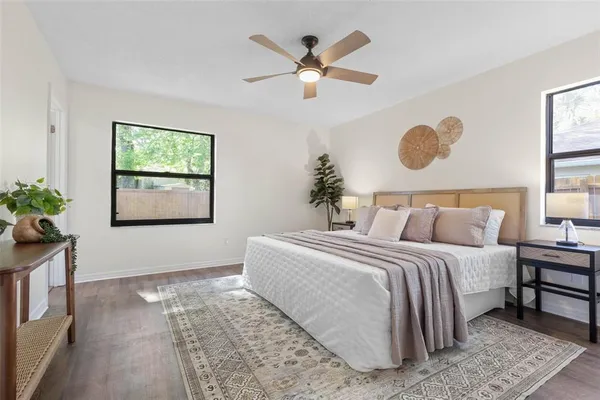 a bed room with a bed and a window