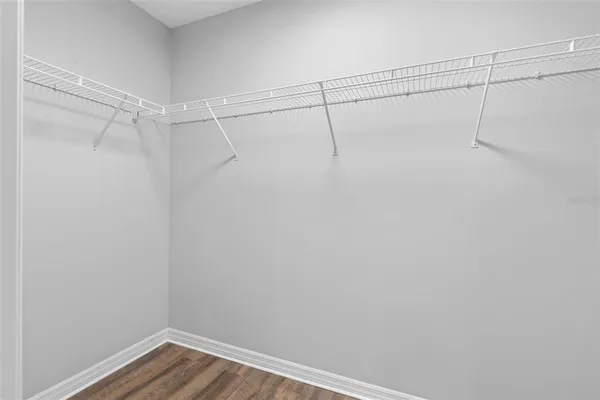 a view of a room with racks on the wall