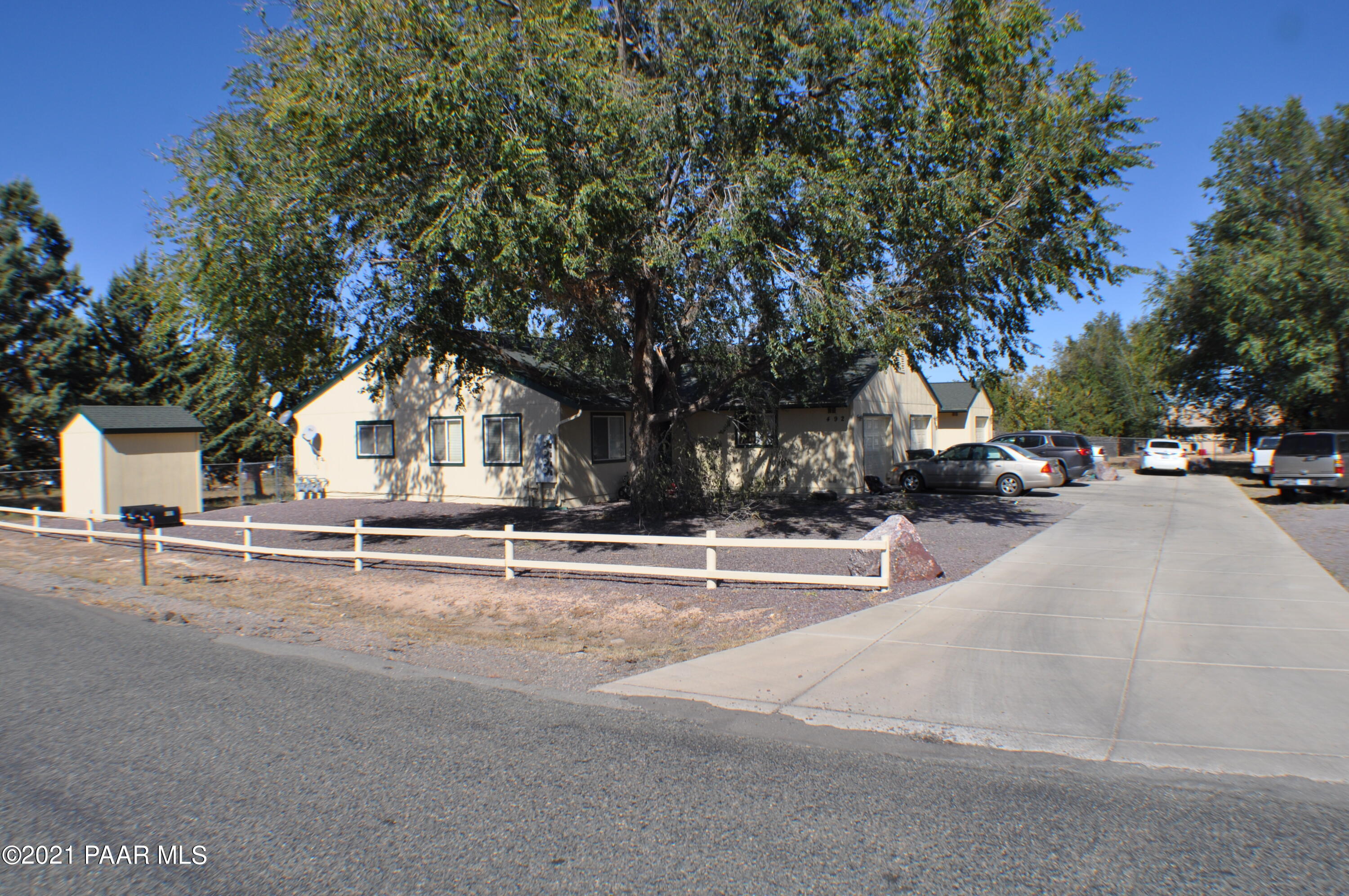 492 West Perkinsville Road Chino Valley, AZ 86323 - Photo 1 of 7 a view of street with houses