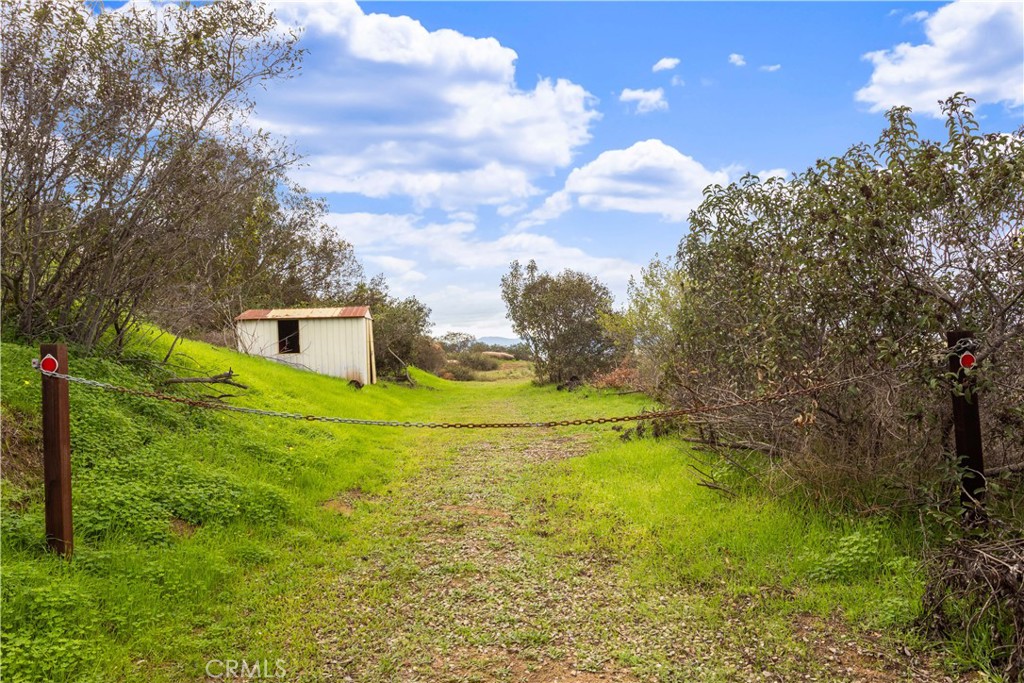 0 Highland Valley Escondido, CA 92025 - Photo 8 of 33 a house view with swimming pool and trees in the background