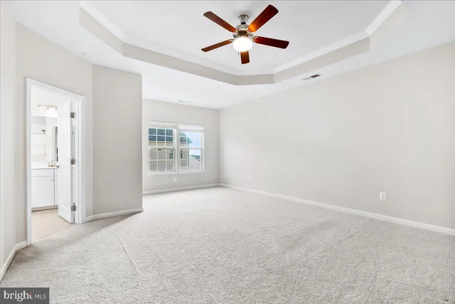 a bathroom with a shower sink and mirror