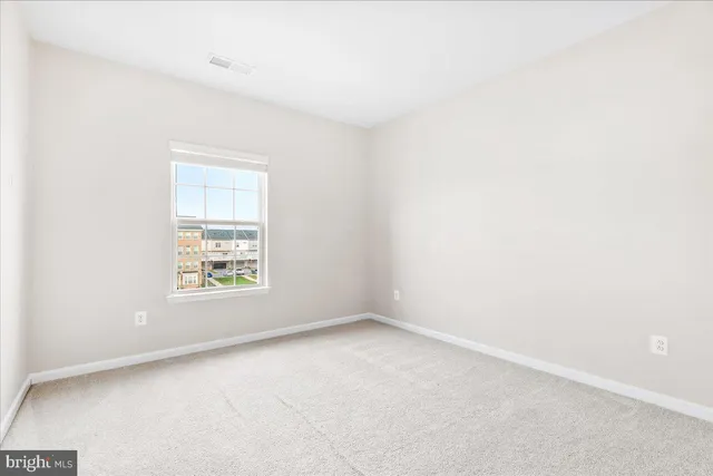 a view of a street with a building