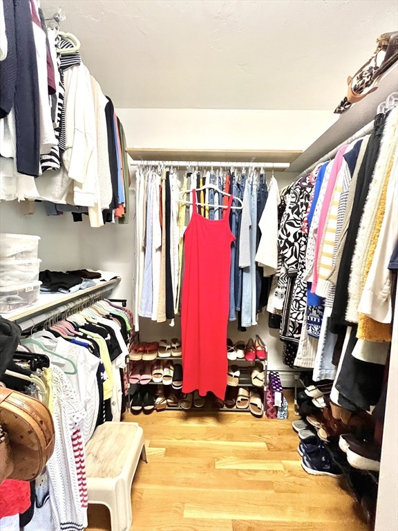 19 Lafayette Road, Unit 3 Ipswich, MA 01938 - Photo 22 of 41 a view of walk in closet with clothes and shoes