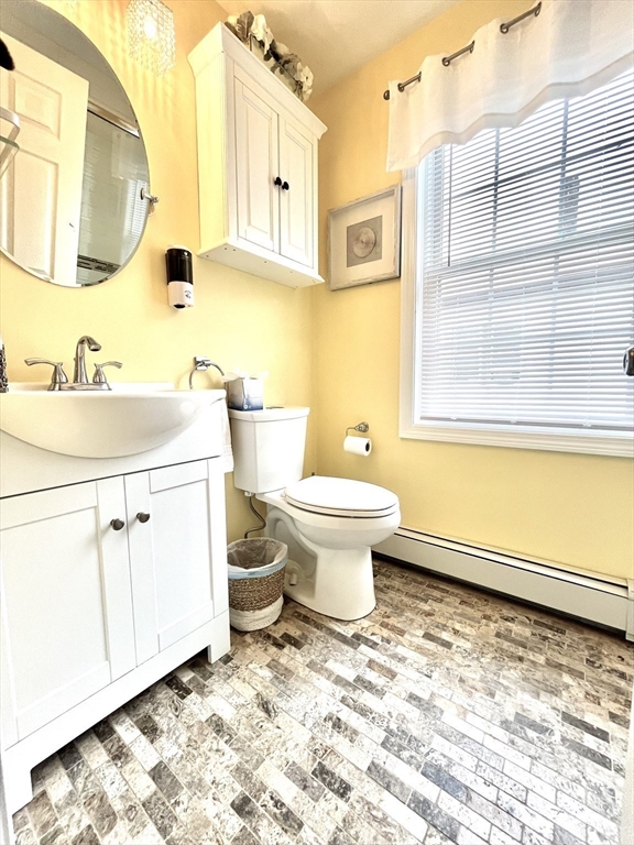 19 Lafayette Road, Unit 3 Ipswich, MA 01938 - Photo 23 of 41 a bathroom with a sink toilet and shower