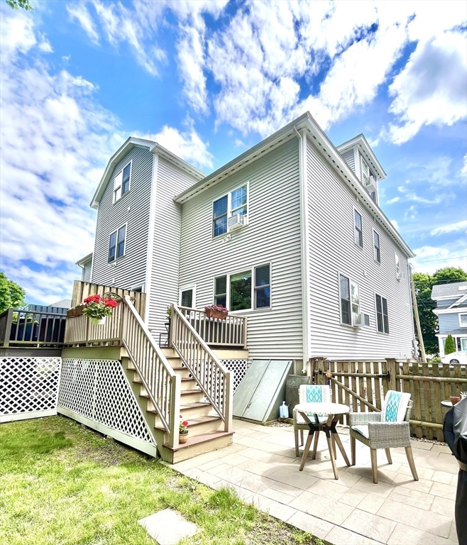 19 Lafayette Road, Unit 3 Ipswich, MA 01938 - Photo 35 of 41 a front view of a house with a yard