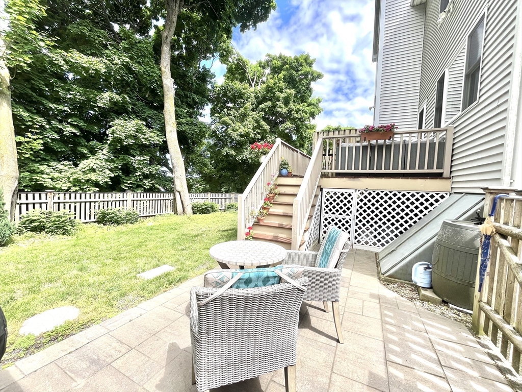 19 Lafayette Road, Unit 3 Ipswich, MA 01938 - Photo 39 of 41 a view of a chair and table on the patio