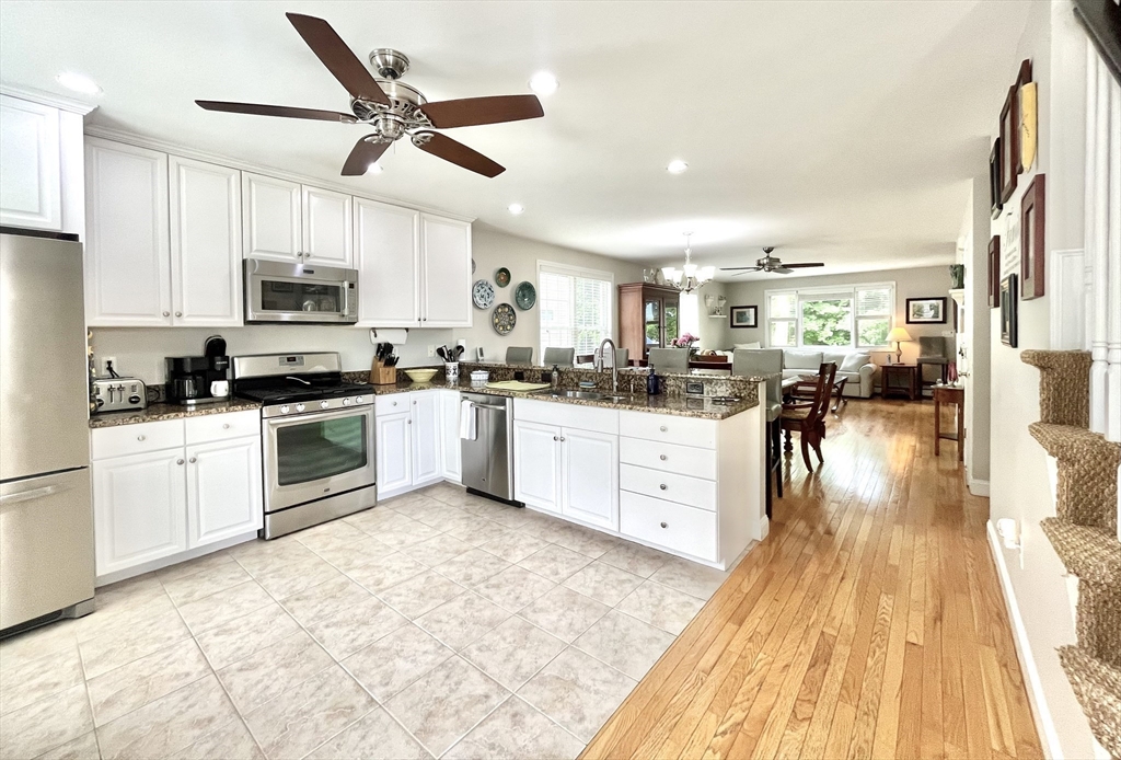 19 Lafayette Road, Unit 3 Ipswich, MA 01938 - Photo 4 of 41 a kitchen with a sink stainless steel appliances and cabinets