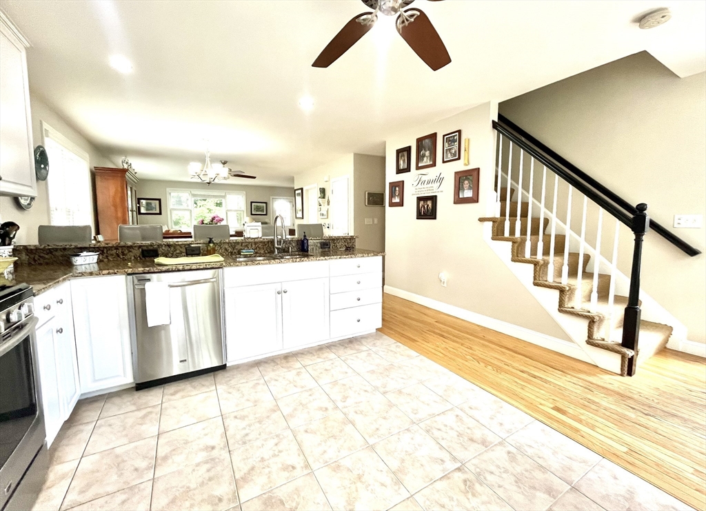 19 Lafayette Road, Unit 3 Ipswich, MA 01938 - Photo 7 of 41 a kitchen with stainless steel appliances granite countertop a sink and cabinets