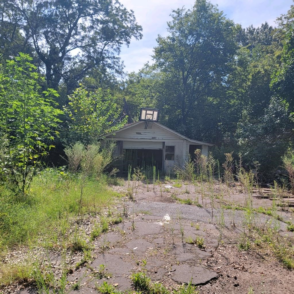 38 East Cypress Street Other, AR 72021 - Photo 9 of 12 a view of a house with a yard