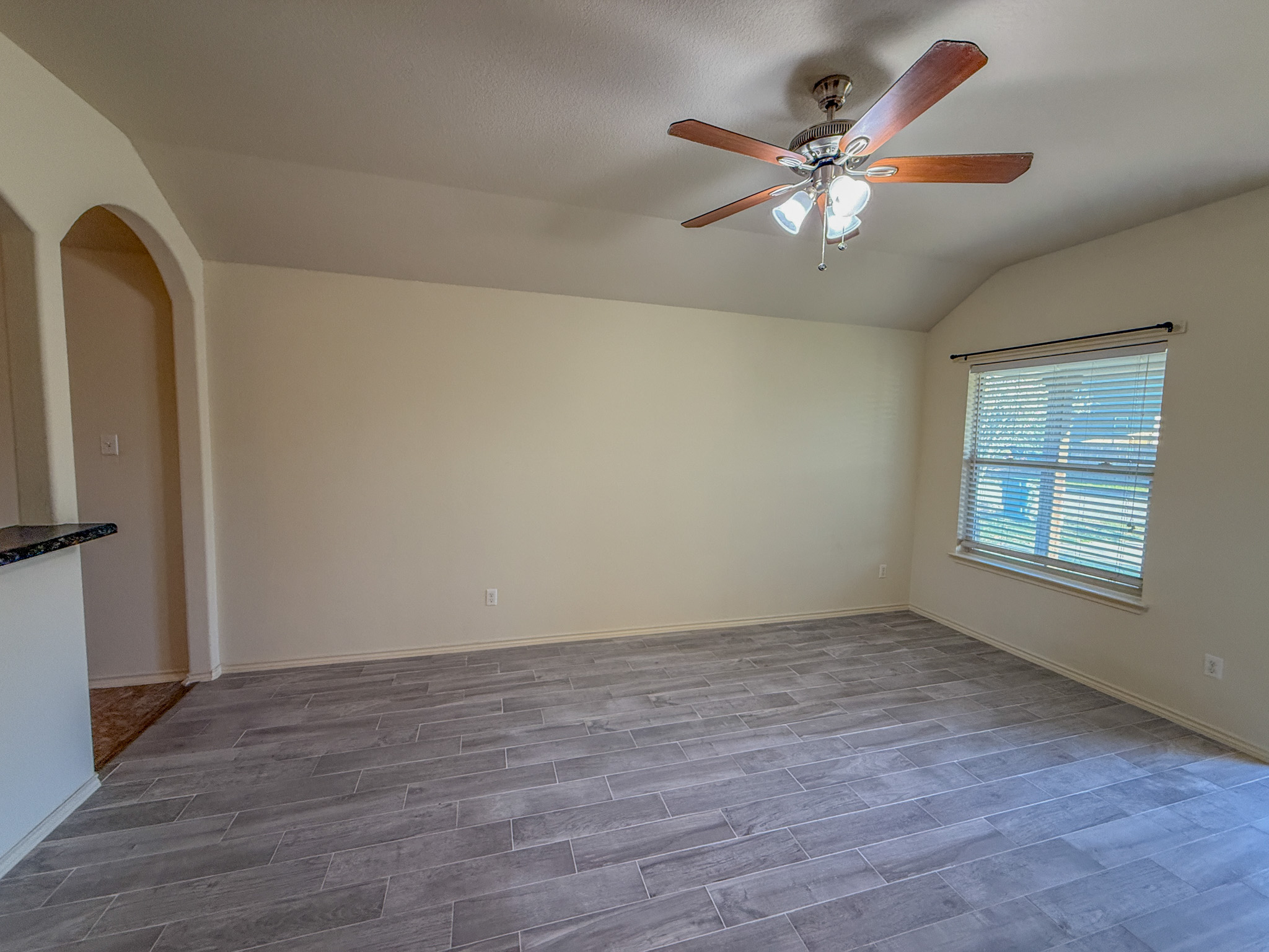 412 Azurite Drive Jarrell, TX 76537 - Photo 5 of 23 an empty room with wooden floor closet and windows