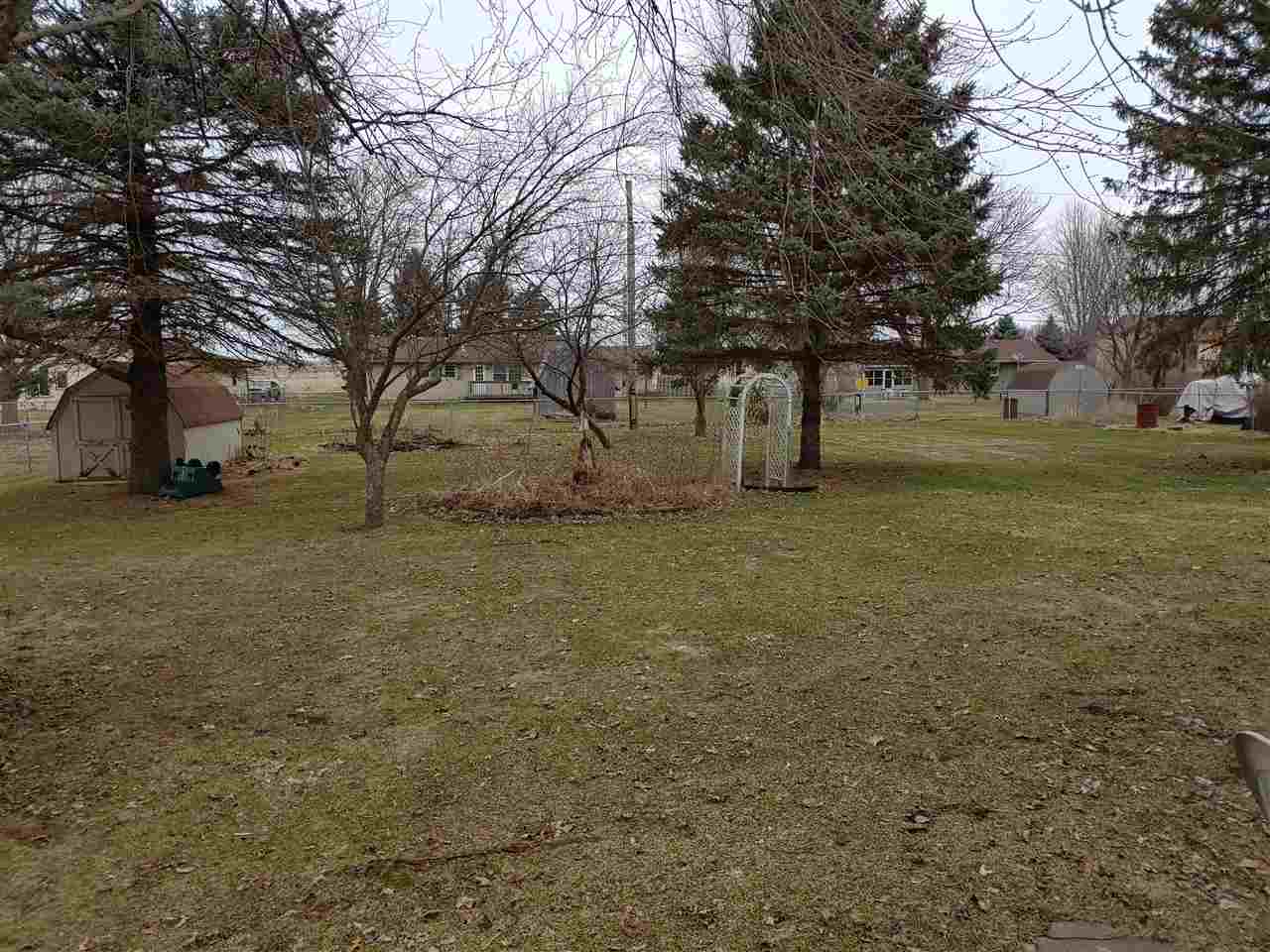 2874 Karr Road Belvidere, IL 61008 - Photo 20 of 20 a view of a yard with trees