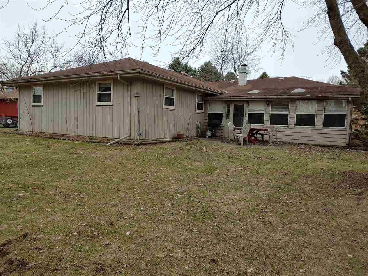 2874 Karr Road Belvidere, IL 61008 - Photo 2 of 20 a house with yard in front of it