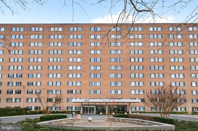 a view of a building with a street