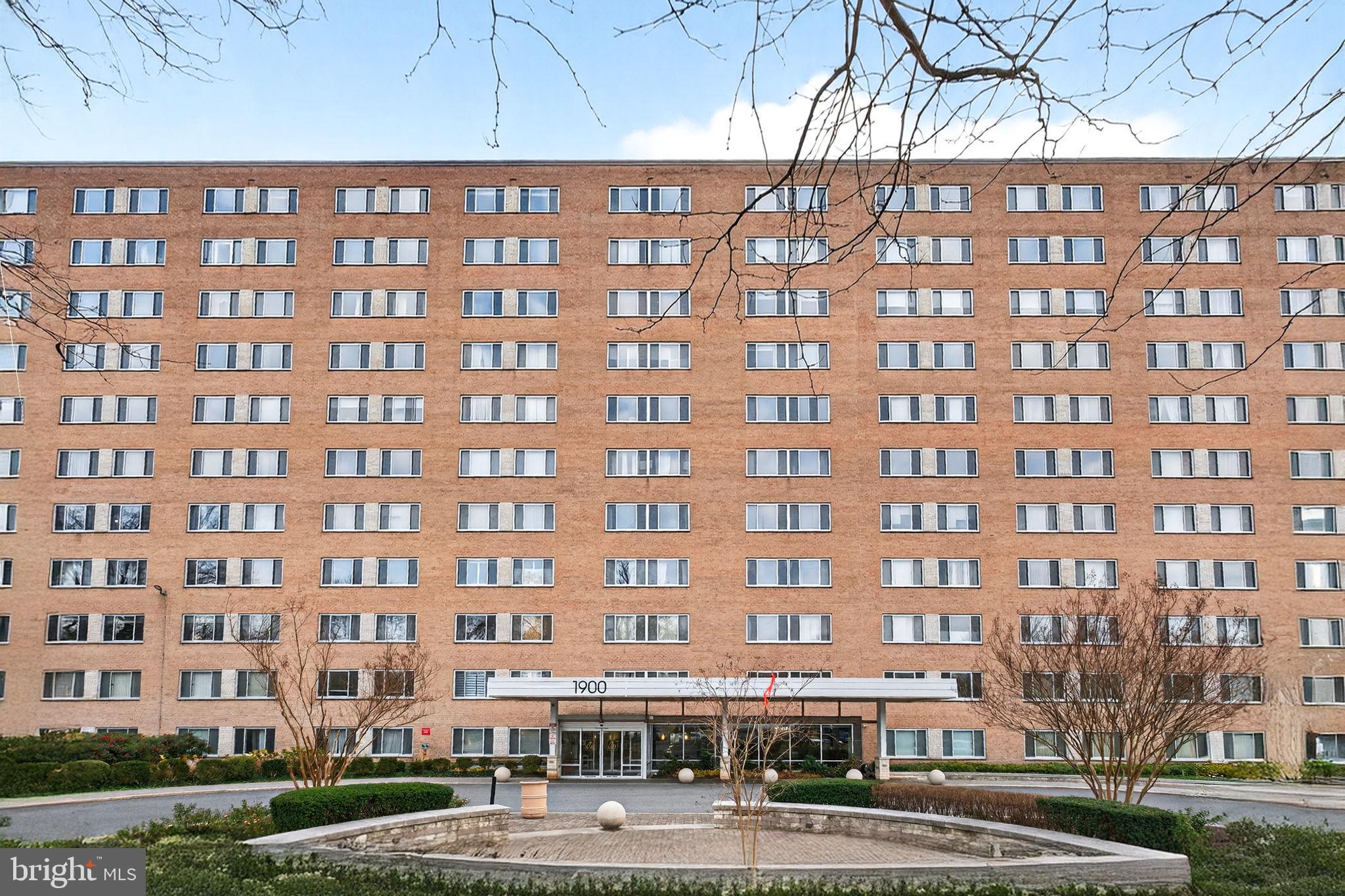 a view of a building with a street