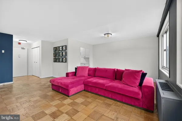 a living room with furniture and a couch