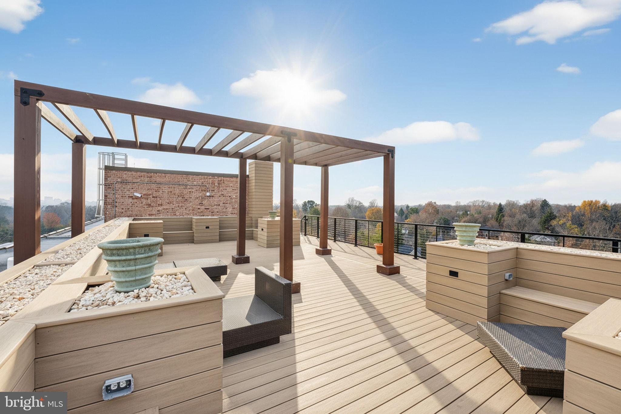 1900 Lyttonsville Road, Unit 618 Silver Spring, MD 20910 - Photo 28 of 36 a living room with furniture and a large window