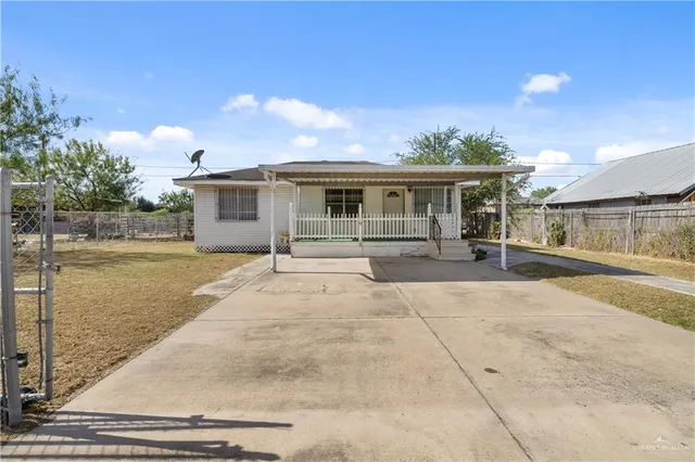 a view of a house with entertaining space