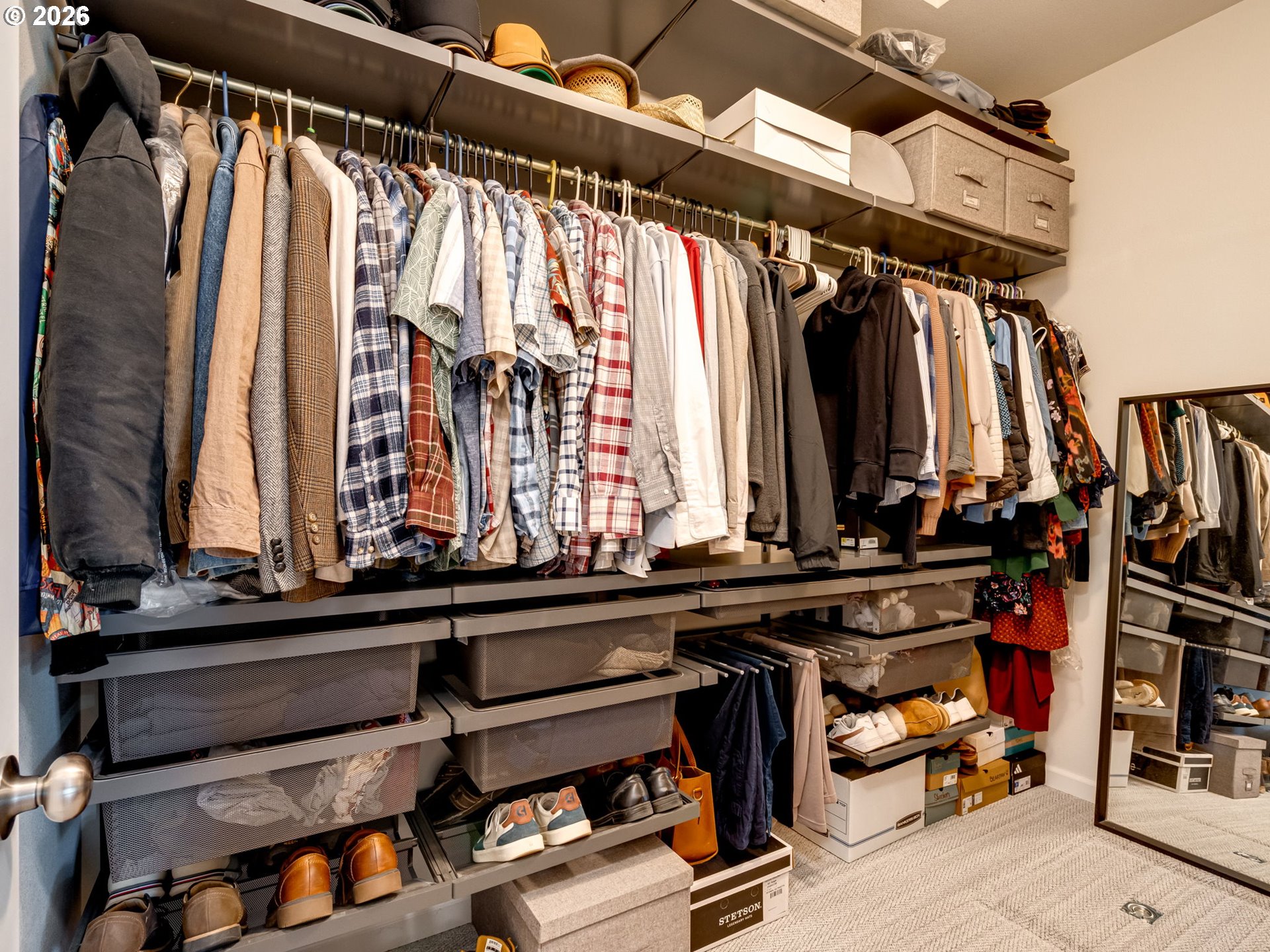 14200 South Union Mills Road Mulino, OR 97042 - Photo 18 of 46 a view of walk in closet with clothes and shoes
