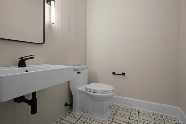 a bathroom with a sink and a toilet