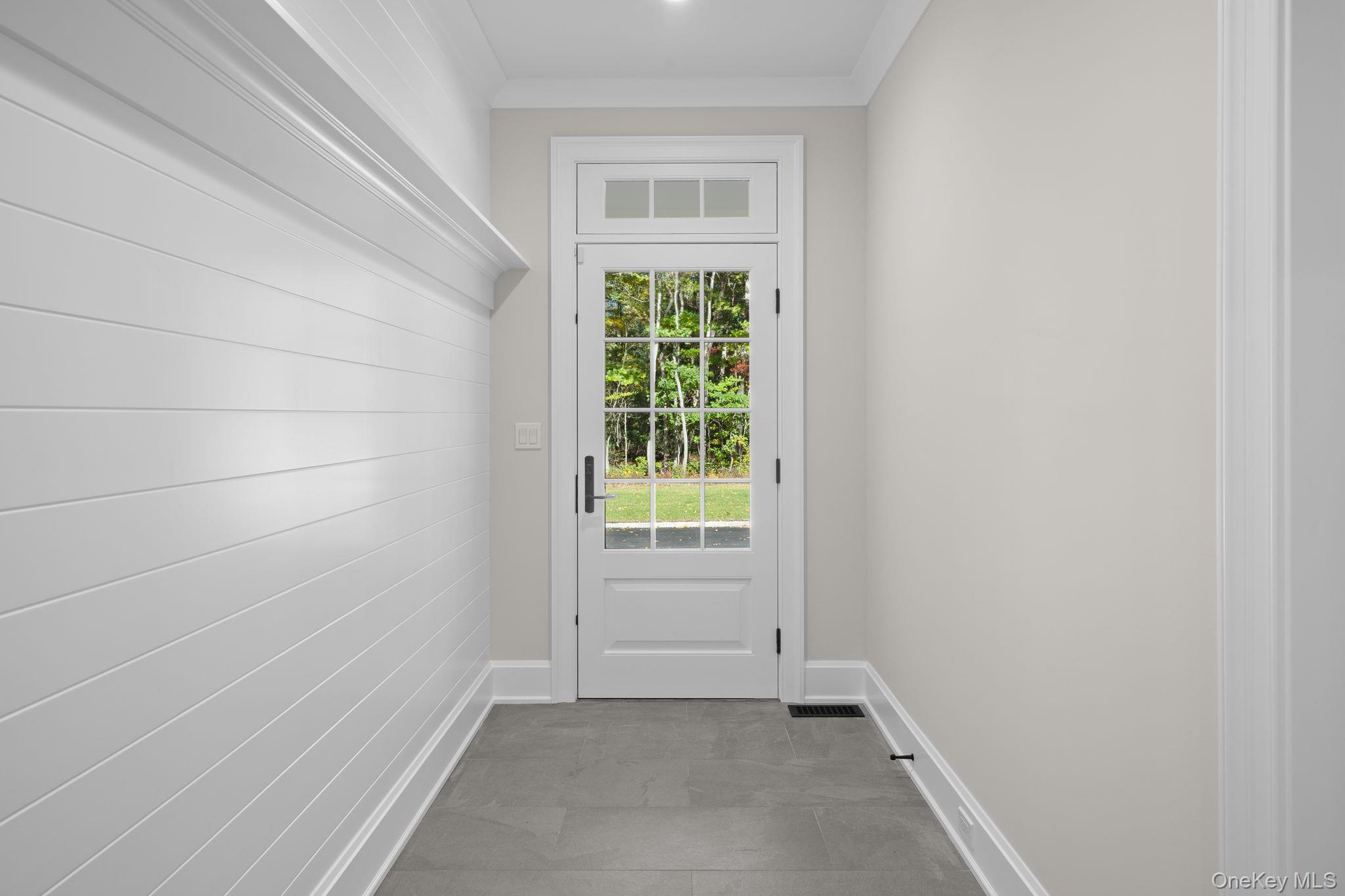 66 Saw Mill Road Cold Spring Harbor, NY 11724 - Photo 20 of 40 a view of an empty room with a window
