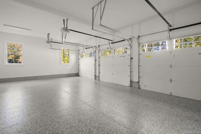 a view of a room with wooden walls