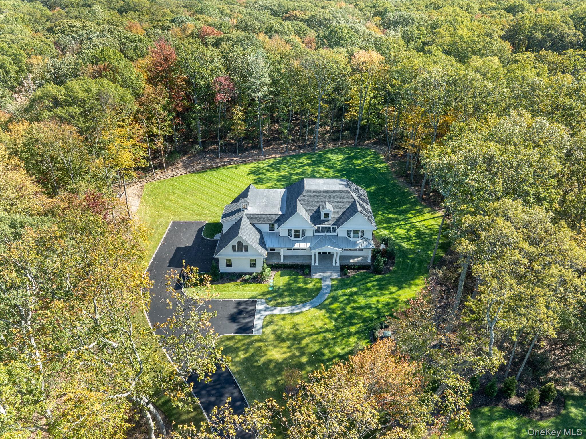 66 Saw Mill Road Cold Spring Harbor, NY 11724 - Photo 7 of 40 an aerial view of a house with a yard swimming pool and outdoor seating