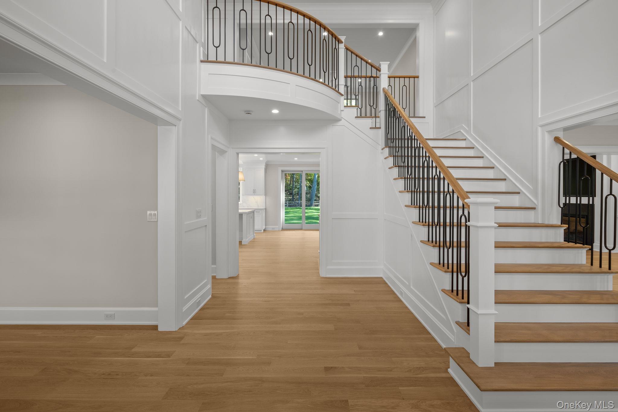 66 Saw Mill Road Cold Spring Harbor, NY 11724 - Photo 9 of 40 a view of entryway and hall with wooden floor
