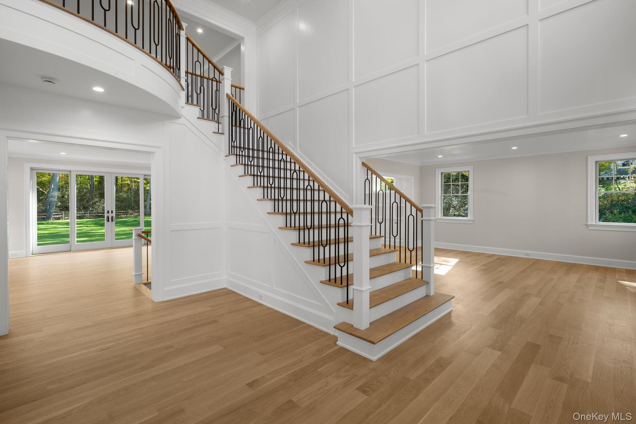66 Saw Mill Road Cold Spring Harbor, NY 11724 - Photo 10 of 40 a view of entryway and hall with wooden floor