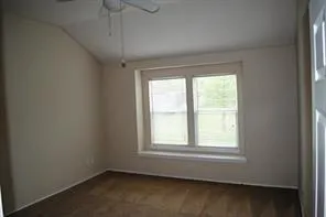 a view of a room that has a window in it