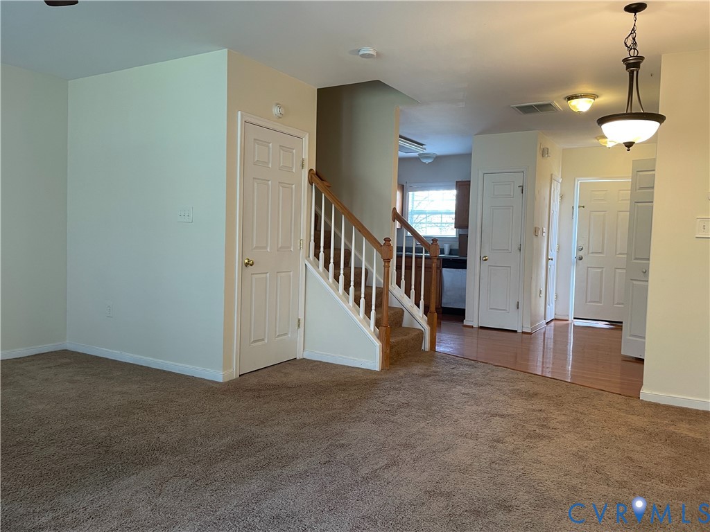 4073 Trisha Trail Midlothian, VA 23112 - Photo 4 of 22 a view of a livingroom with a staircase