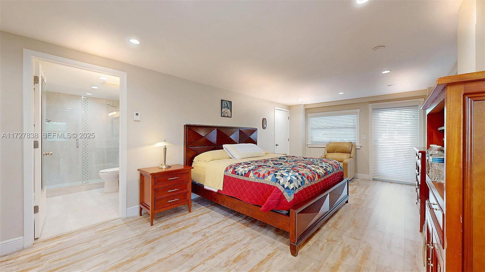 28 Center Lane Key Largo, FL 33037 - Photo 11 of 93 a bedroom with a bed and a mirror