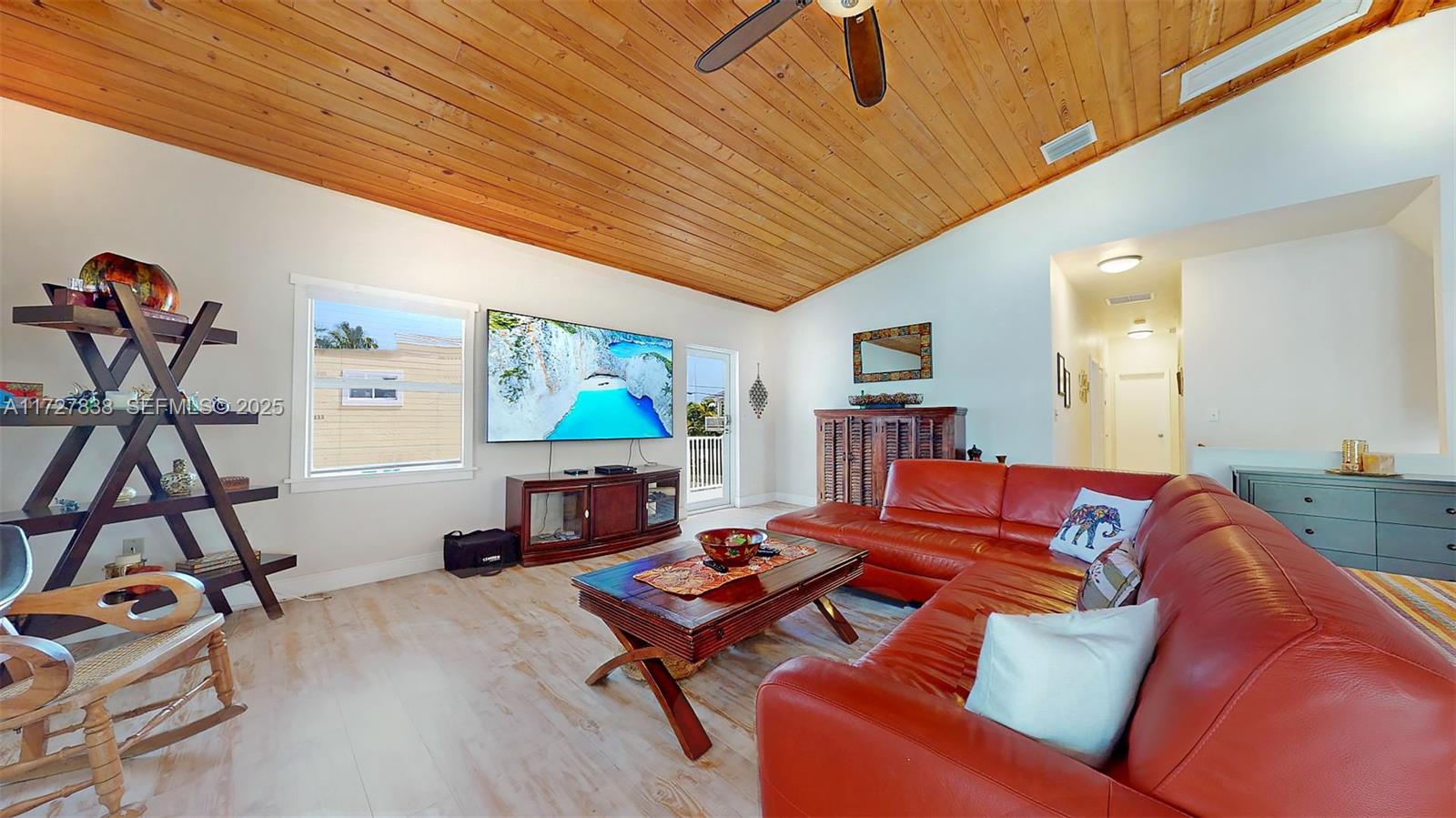 28 Center Lane Key Largo, FL 33037 - Photo 23 of 93 a living room with furniture and a flat screen tv