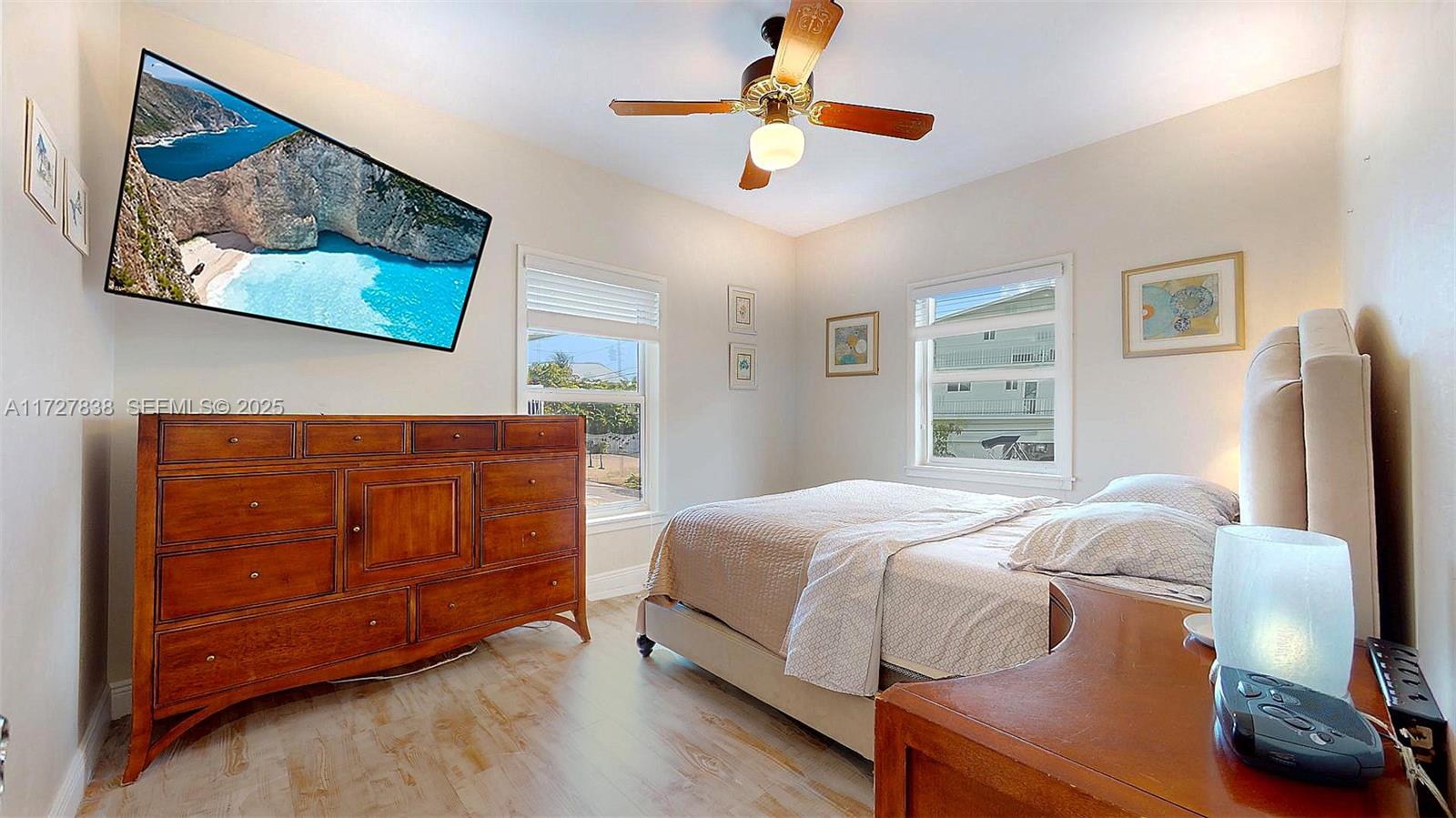 28 Center Lane Key Largo, FL 33037 - Photo 30 of 93 a bedroom with a bed and dresser