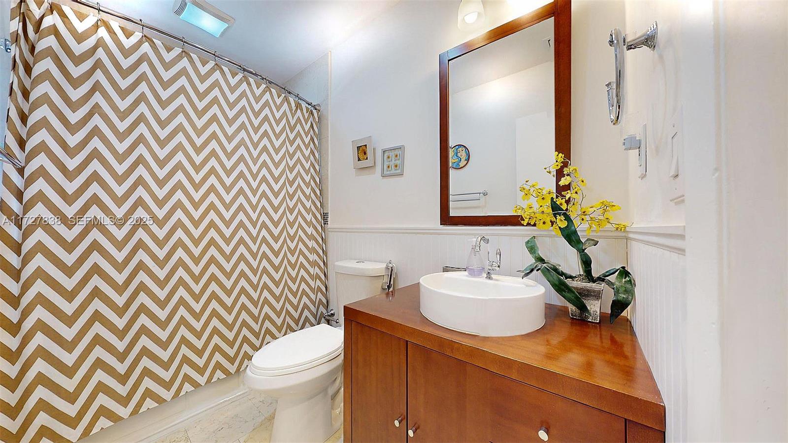 28 Center Lane Key Largo, FL 33037 - Photo 31 of 93 a bathroom with a sink toilet and mirror