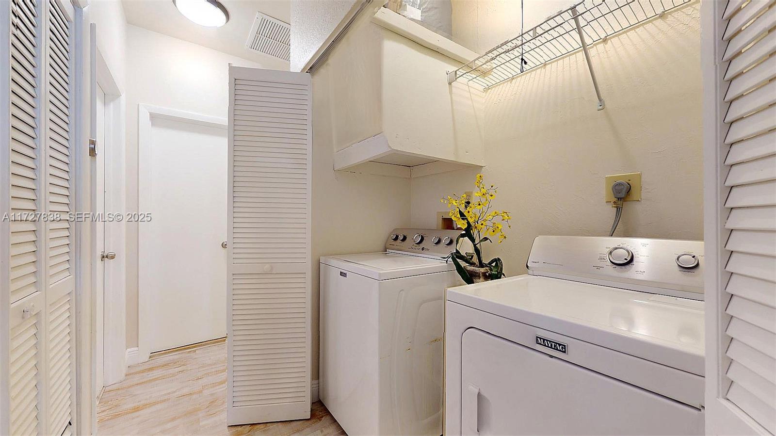 28 Center Lane Key Largo, FL 33037 - Photo 36 of 93 a view of storage and utility room with washer and dryer