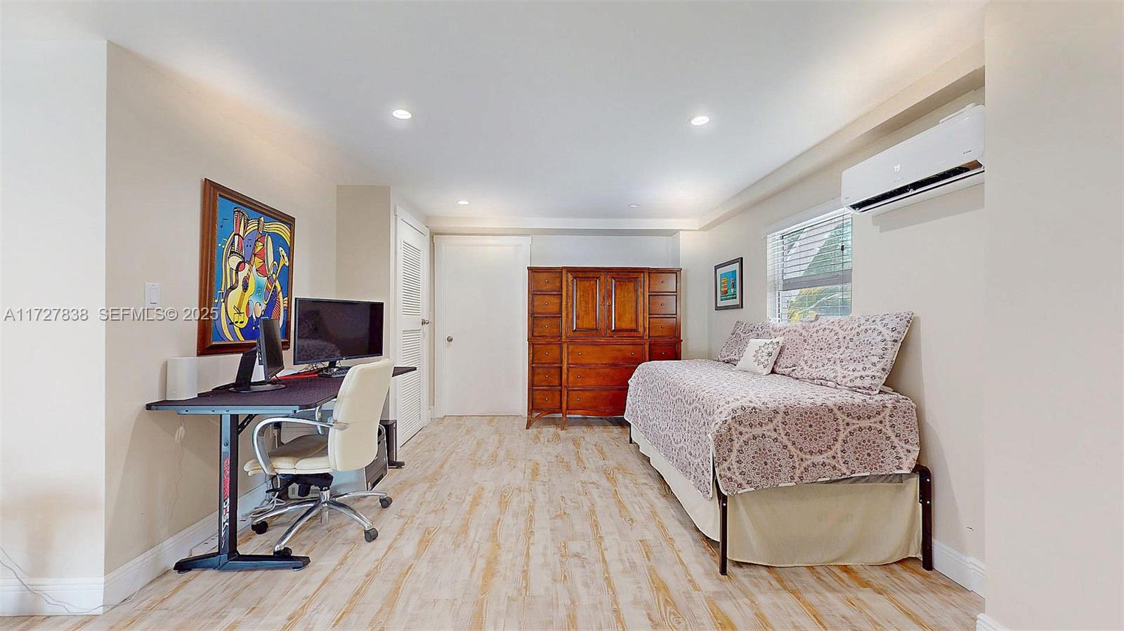 28 Center Lane Key Largo, FL 33037 - Photo 4 of 93 a bedroom with furniture and a flat screen tv