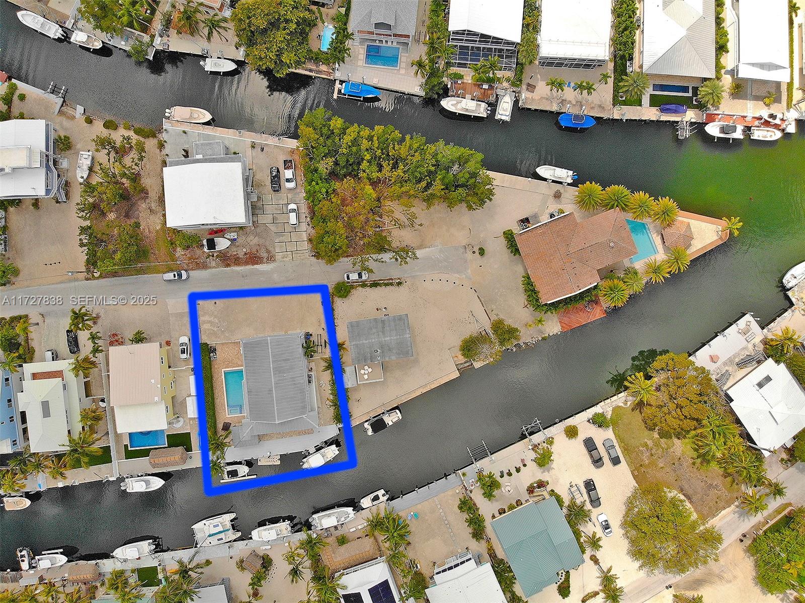 28 Center Lane Key Largo, FL 33037 - Photo 52 of 93 an aerial view of a house with outdoor space