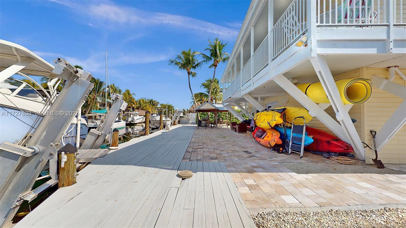 28 Center Lane Key Largo, FL 33037 - Photo 57 of 93 a view of a street with cars