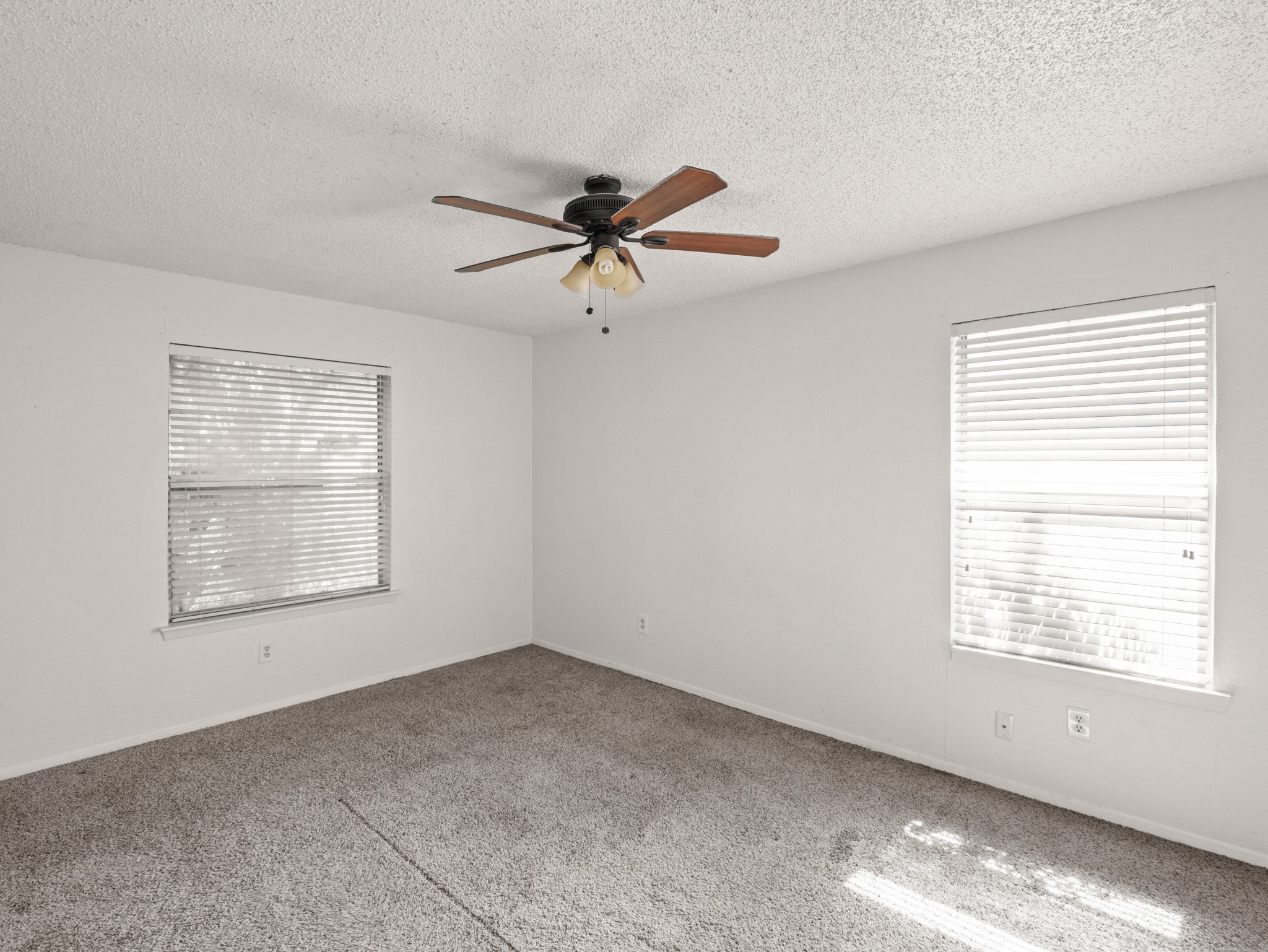 3507 Alpine Circle Austin, TX 78704 - Photo 21 of 30 wooden floor in an empty room with a window