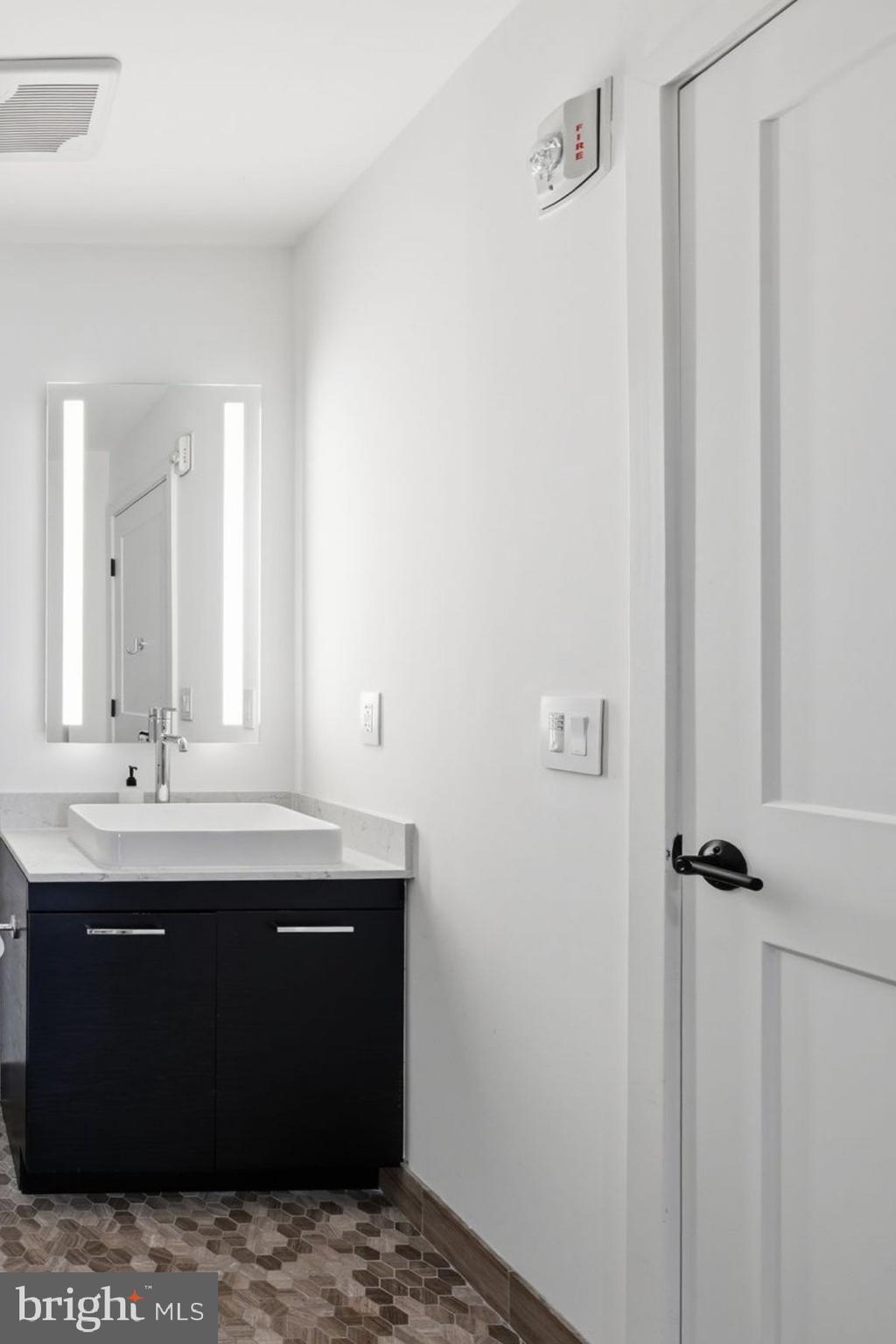 70 N Street Southeast, Unit N706 Washington, DC 20003 - Photo 12 of 23 Bright light in the bathroom