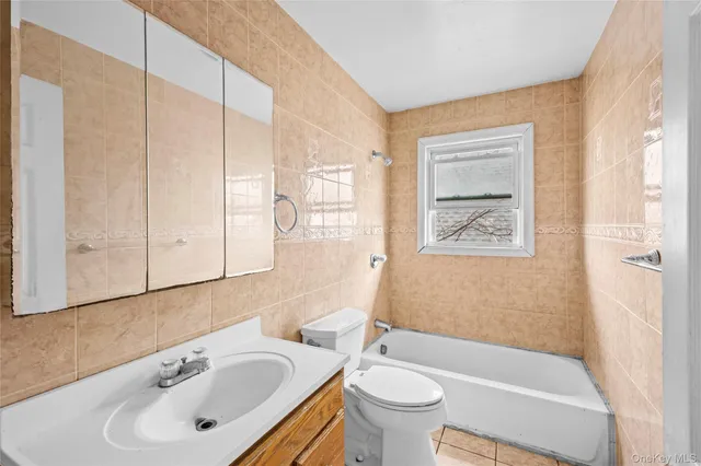 a bathroom with a sink and a bathtub