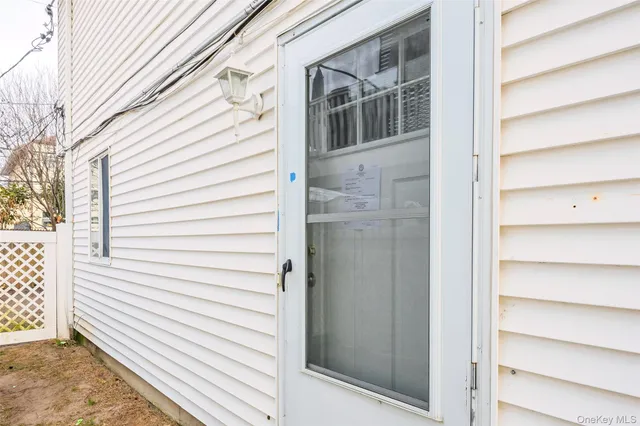 a view of front door and deck
