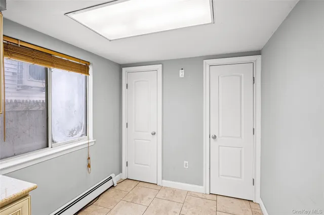 a view of an empty room with window