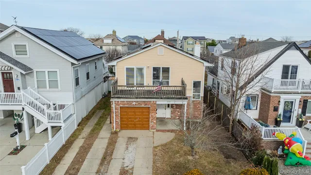a view of a house with roof deck