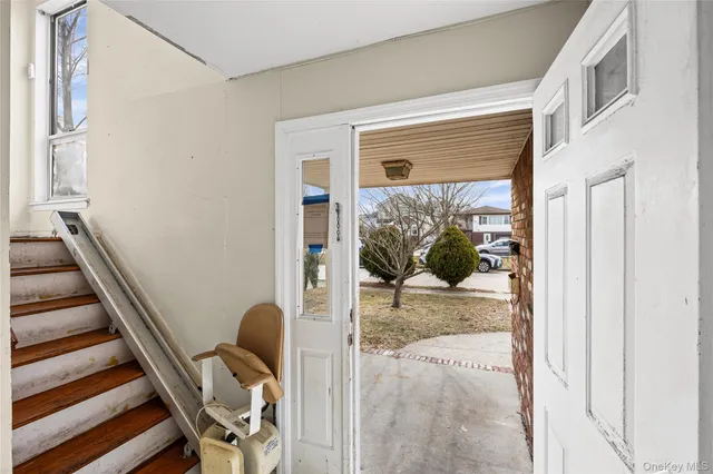 a view of a balcony and chair