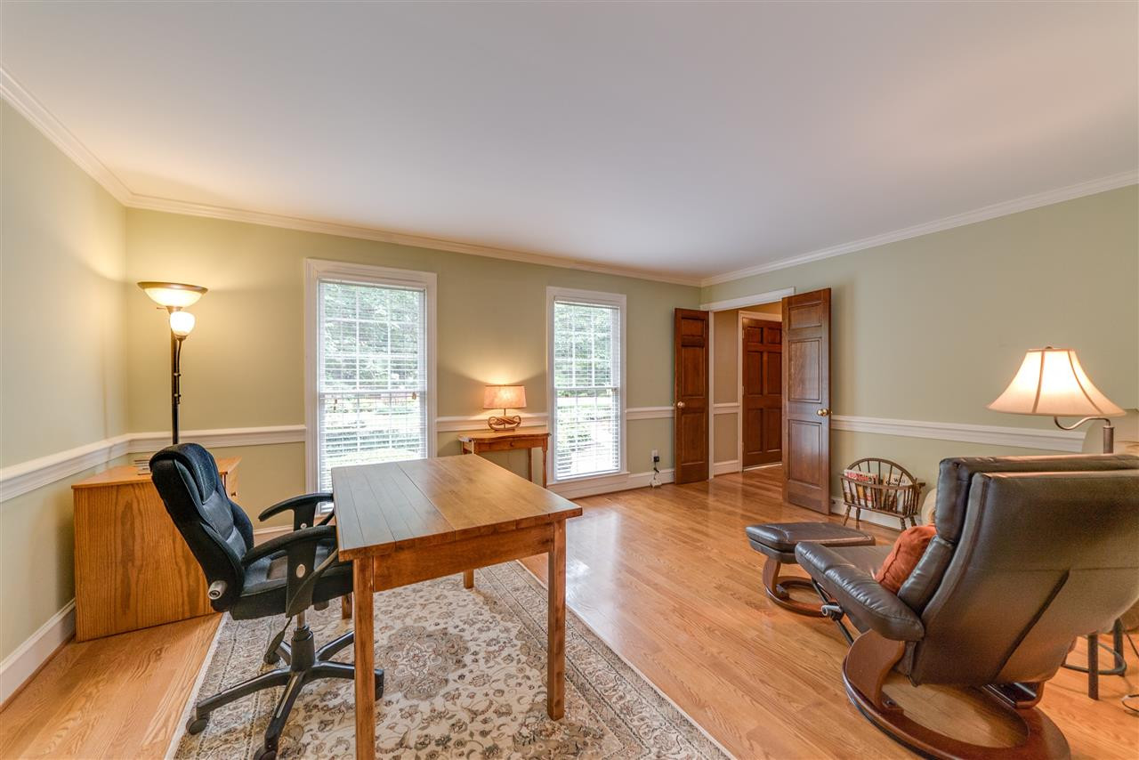 9301 Foxburrow Court Raleigh, NC 27613 - Photo 10 of 25 This room is big enough to serve as a formal living + office! Doors are available to close if privacy is needed! Living Room