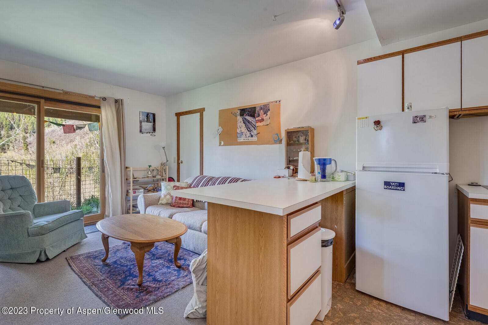 903 McLaughlin Lane Basalt, CO 81621 - Photo 16 of 28 a view of kitchen island with furniture and windows