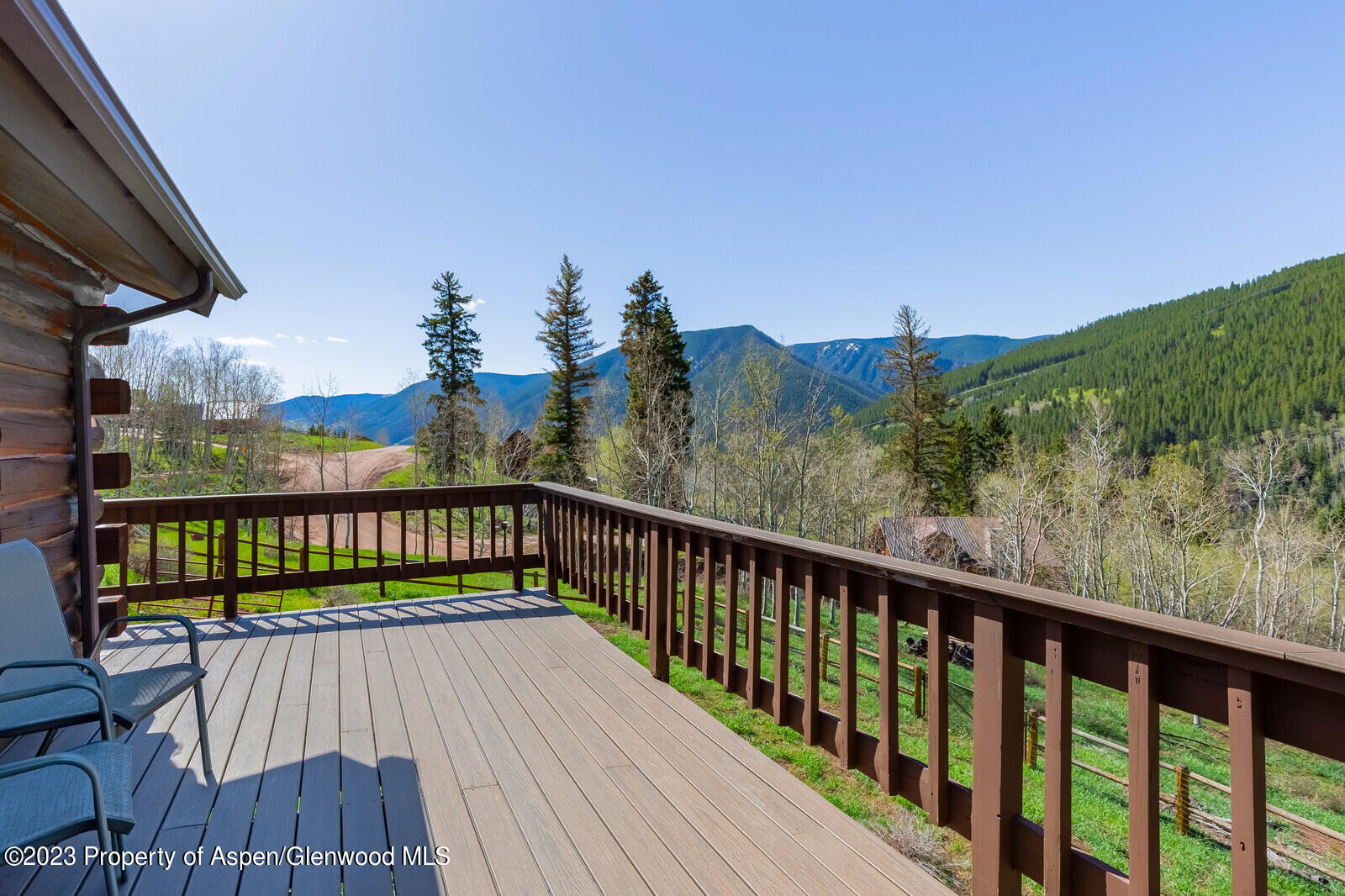 903 McLaughlin Lane Basalt, CO 81621 - Photo 22 of 28 a view of a balcony with wooden floor & fence